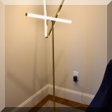 DL05. West Elm Light Rods LED floor lamp with 3 lights.  